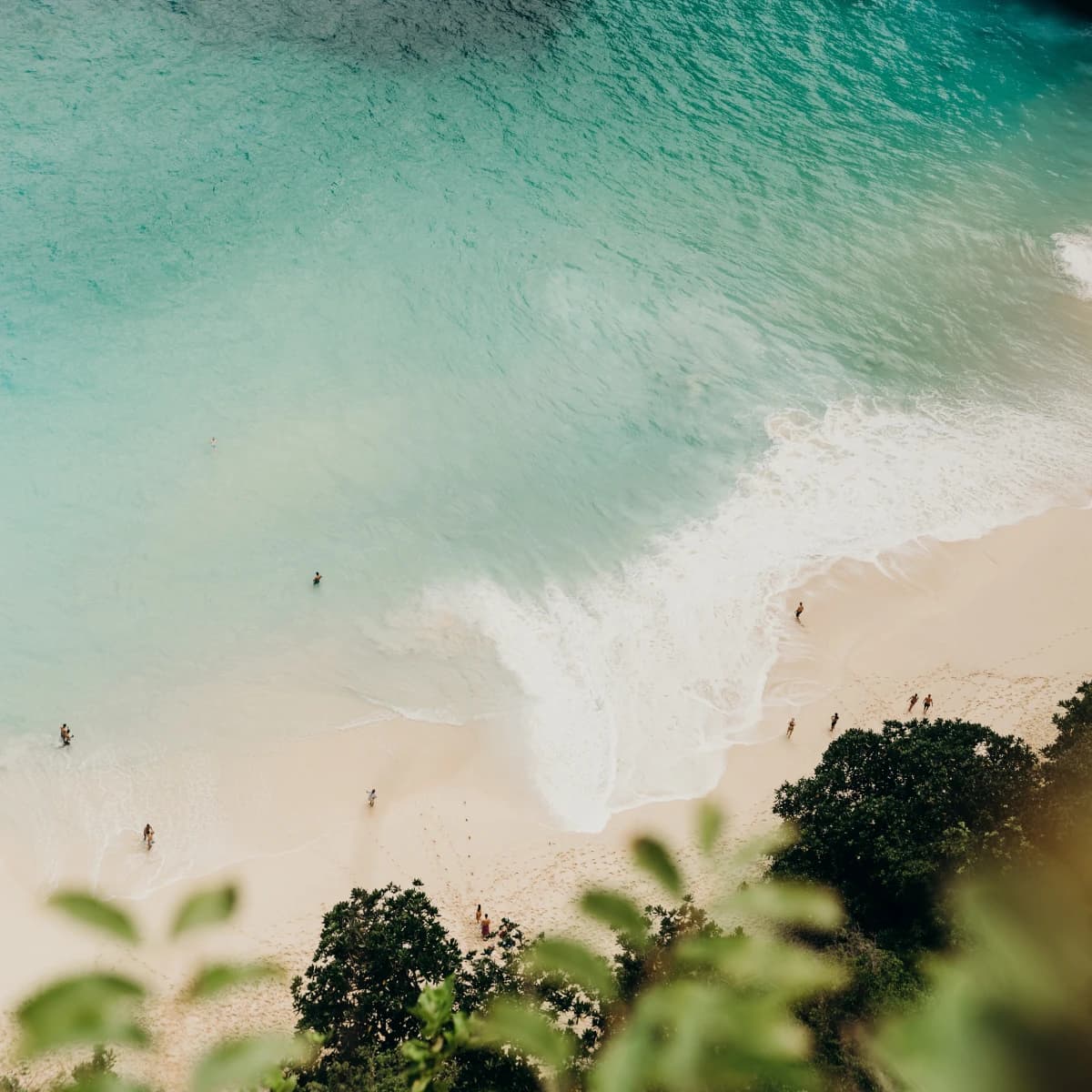 People on a beach in Bali